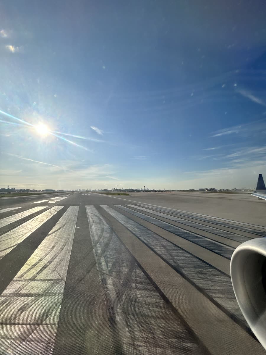 View from a plane window on the runway
