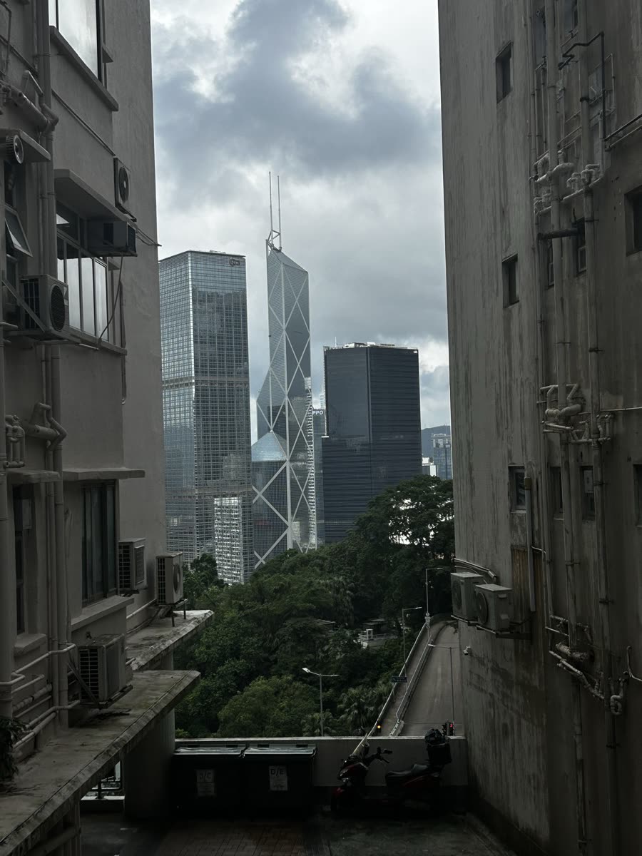 A tower framed between two buildings